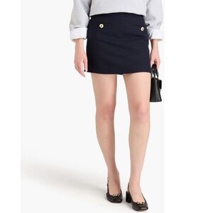 Sandro navy blue miniskirt with small side, slit and white buttons with gold